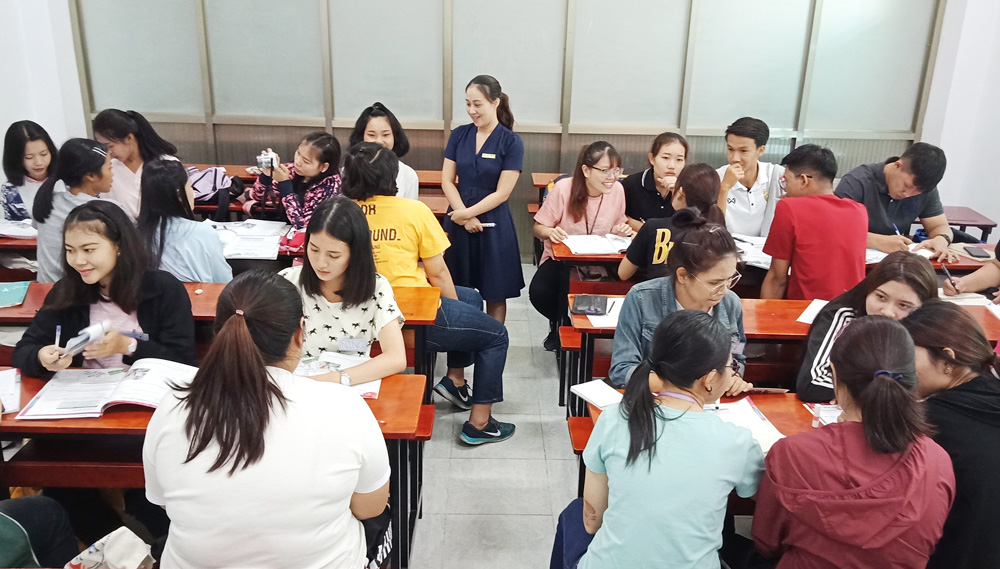 Thai students participating in group activities during the 'English and Culture' lessons